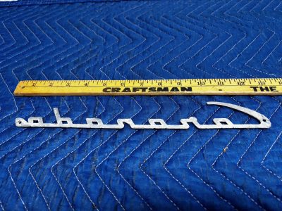Century coronado side script (pitted)